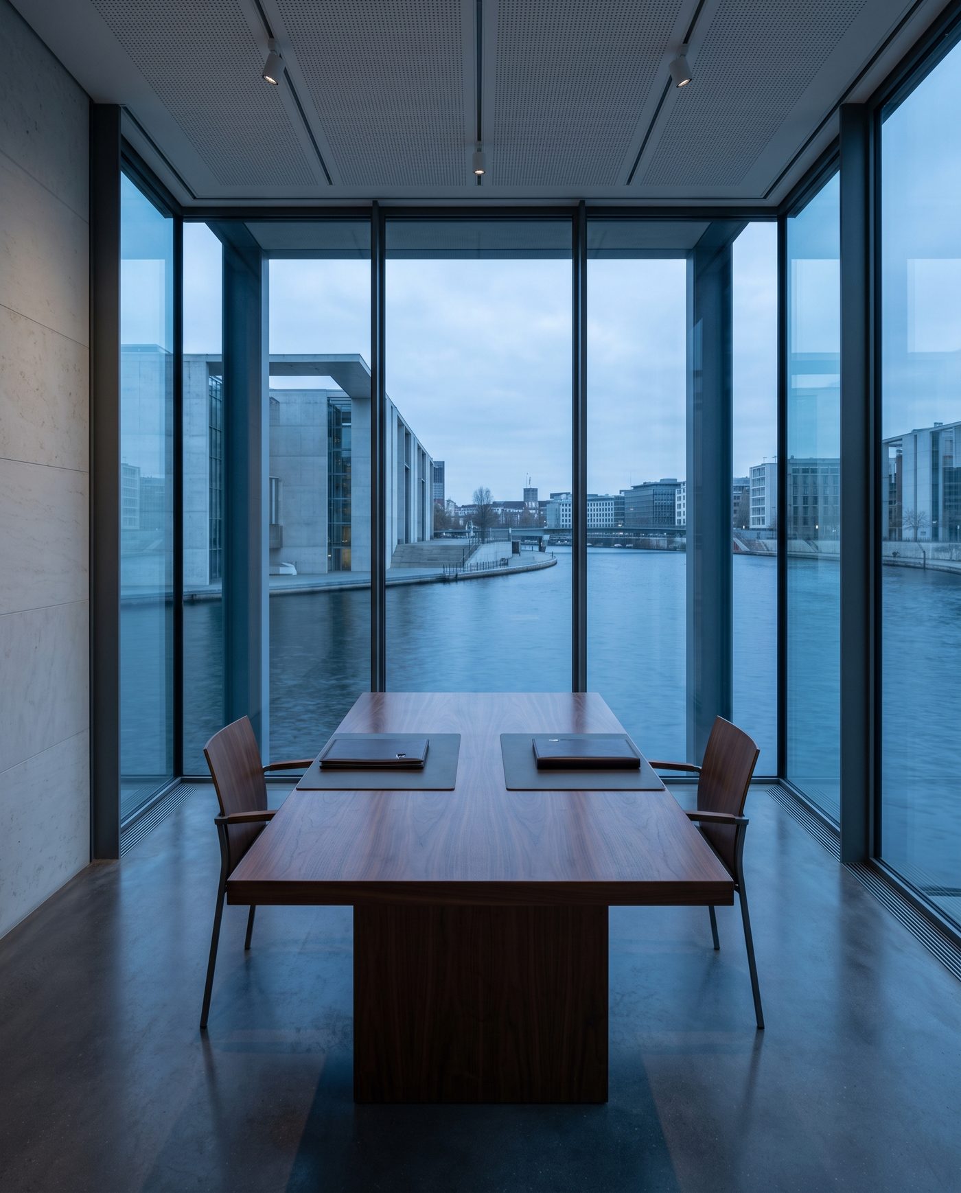 An empty glass-walled meeting room, two closed folios facing each other across a walnut table.